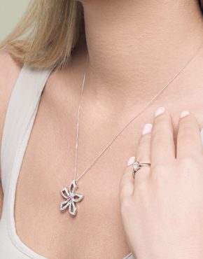 GUY WAKELING SIGNATURE COLLECTION // 18ct white gold diamond flower design pendant